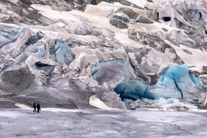 un agency cites worrying warming trend as cop28 summit grapples with curbing climate change