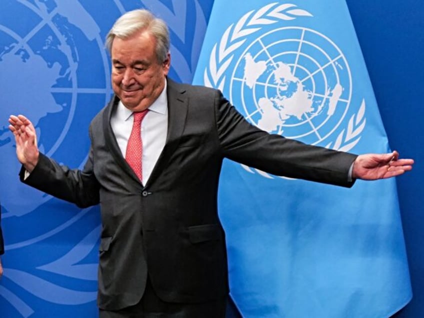 Russian Foreign Minister Sergei Lavrov (L) greets UN Secretary-General Antonio Guterres before a meeting at UN headquarters in New York on January 23, 2024. (Photo by Charly TRIBALLEAU / AFP)