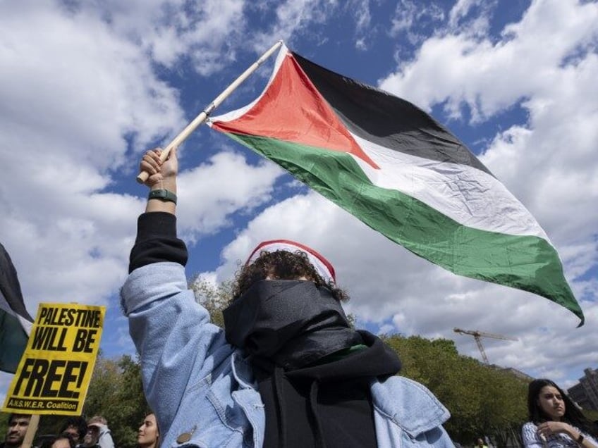 Pro-Palestinian demonstrators rally outside the White House in Washington, Sunday, Oct. 8, 2023, after Hamas terrorists invaded Israel, killing and kidnapping civilians. (photo by Manuel Balce Ceneta/AP)