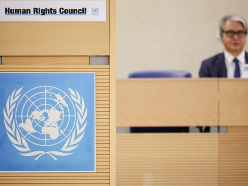 26 February 2024, Switzerland, Genf: A lectern with the UN logo stands in the hall during