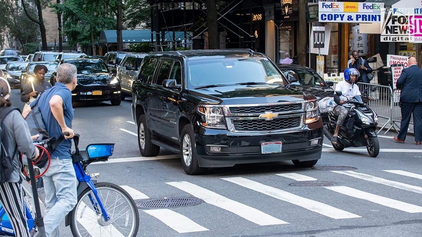 un leaders rail against emissions as swarms of gas guzzling suvs descend on city