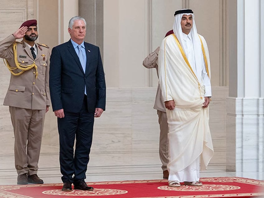 Emir of Qatar, Tamim bin Hamad Al Thani (R) receives President of Cuba, Miguel Diaz Canel (2nd L) in Lusail, Qatar on December 03, 2023. (Photo by Amiri Diwan of the State of Qatar / Handout/Anadolu via Getty Images)