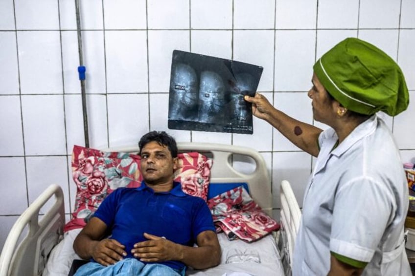 A protester who partially lost his sight after being shot during the student-led uprising