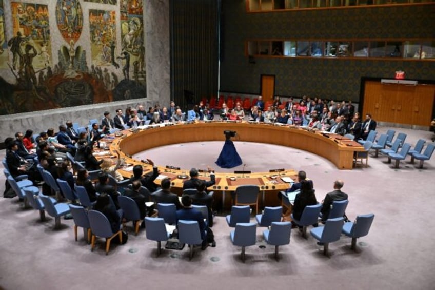 United Nations Security Council members votes to adopt a US-drafted resolution supporting