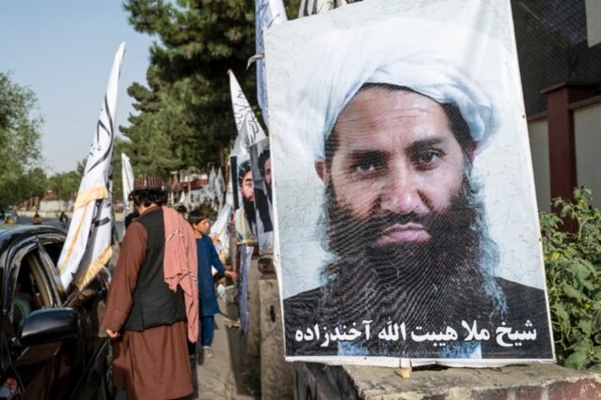 A poster of Taliban Supreme Leader Hibatullah Akhundzada on a road in Kabul in August 2023: the UN Security Council adopted a resolution calling for a special envoy for Afghanistan to increase engagement with the country's leaders