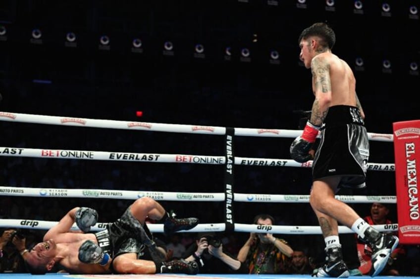 Jesse Rodriguez knocks out Juan Francisco Estrada in the seventh round of their WBC super