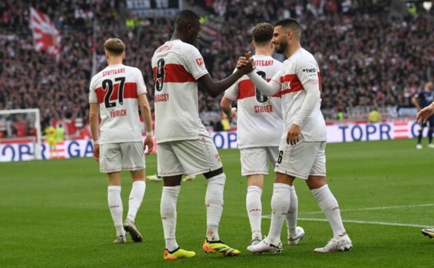 Team work: Stuttgart forward Serhou Guirassy (2ndL) is congratulated by Deniz Undav (R) af