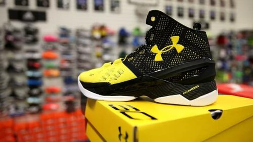 under armour approves restructuring warns of collapse in clothing demand collapse as buyback authorized to save plunging stock