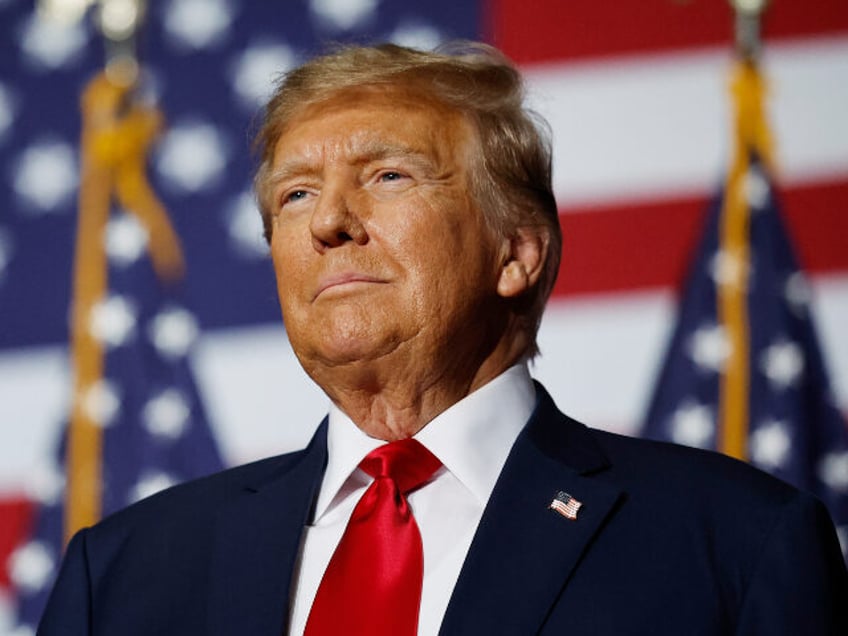 Former President Donald Trump speaks at his caucus night event at the Iowa Events Center o