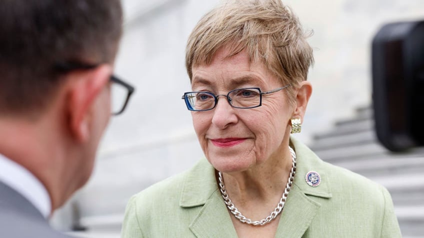 Marcy Kaptur with reporters