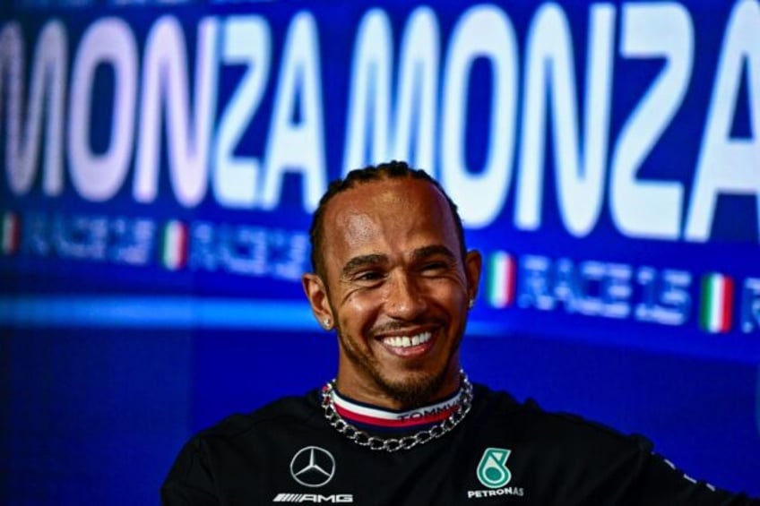 unfinished business pushes hamilton to two more years at mercedes