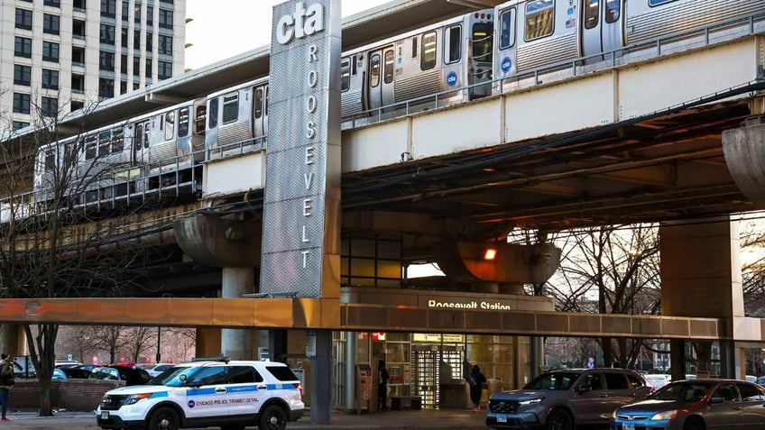 A police vehicle parked outside a Chicago CTA station