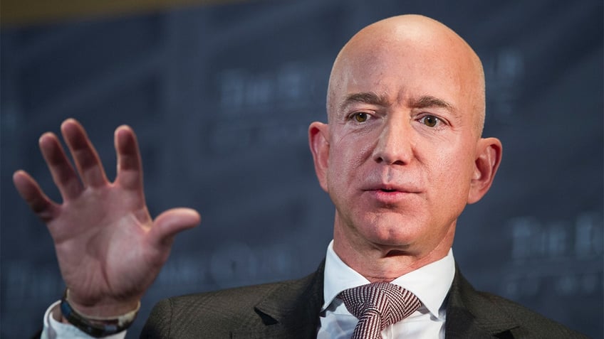 union workers at jeff bezos wapo plan walkout as insiders question billionaire owners role in newsroom drama