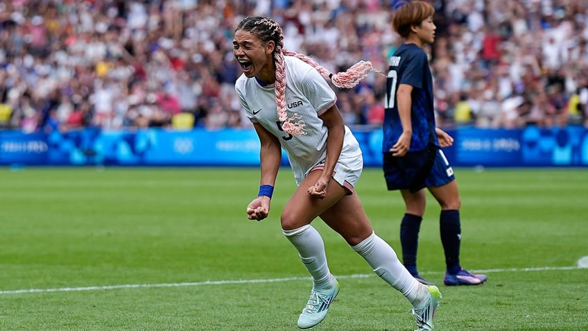 Trinity Rodman celebrates