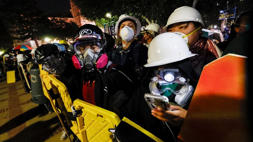 Protesters wearing face masks