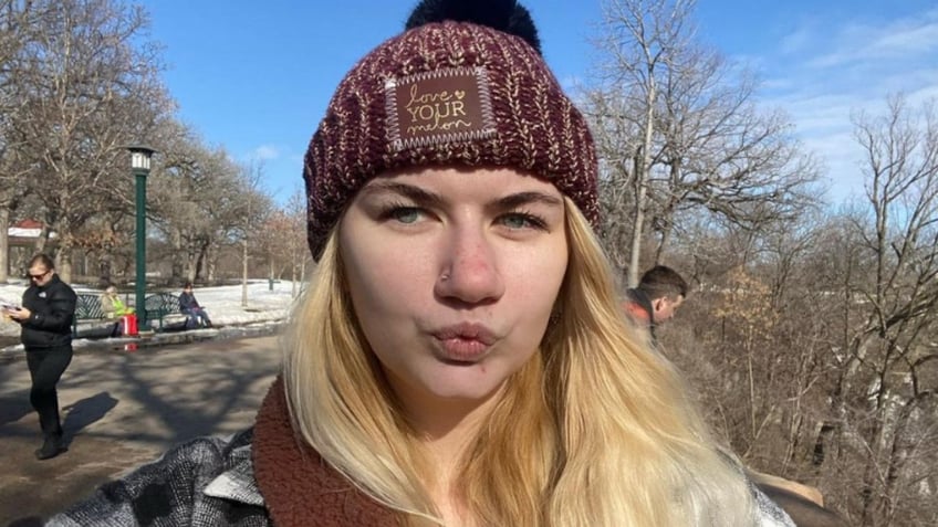 Genevieve Lizotte wearing a hat