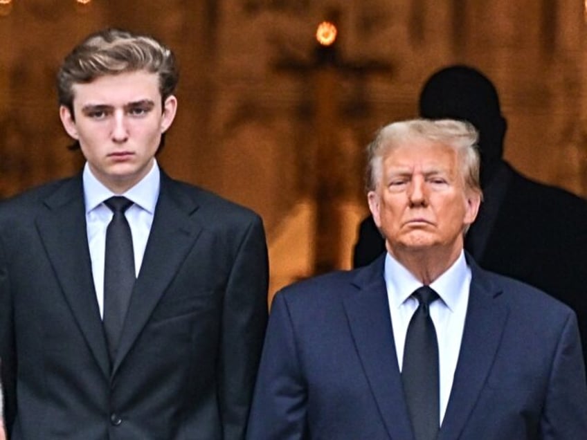 Former US President Donald Trump (center right) stands with his wife Melania Trump (2L) th