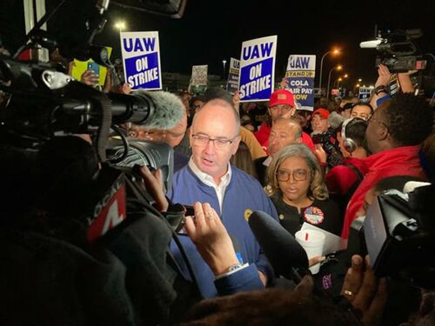 unprecedented uaw strike 13000 workers walk off job at big three us auto plants