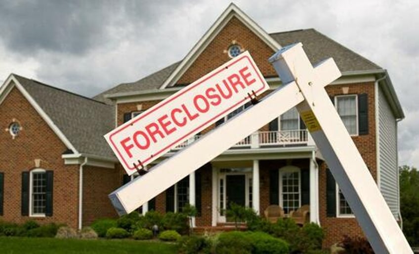 Foreclosure sign outside a house