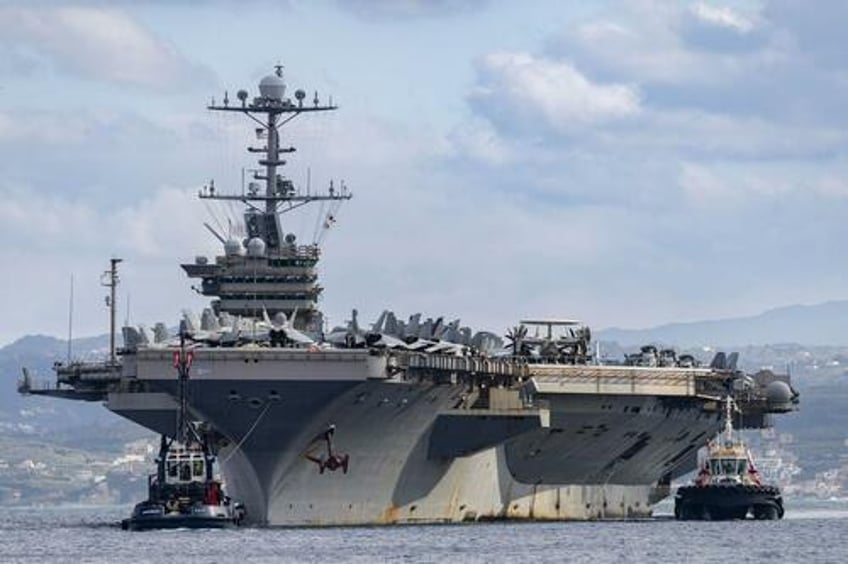 us aircraft carrier damaged after colliding with huge merchant ship off egypt