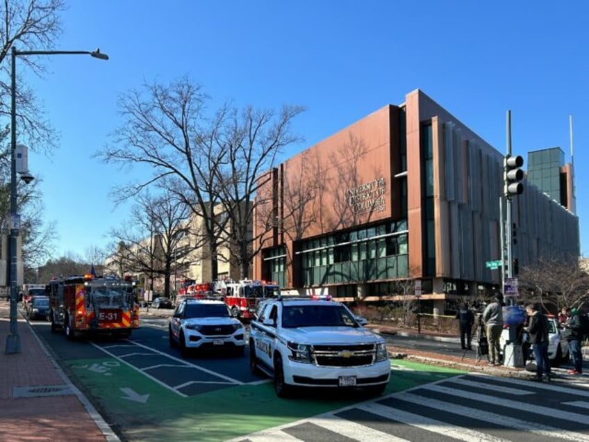 US Secret Service vehicles block access to a street leading to the Embassy of Israel in Wa