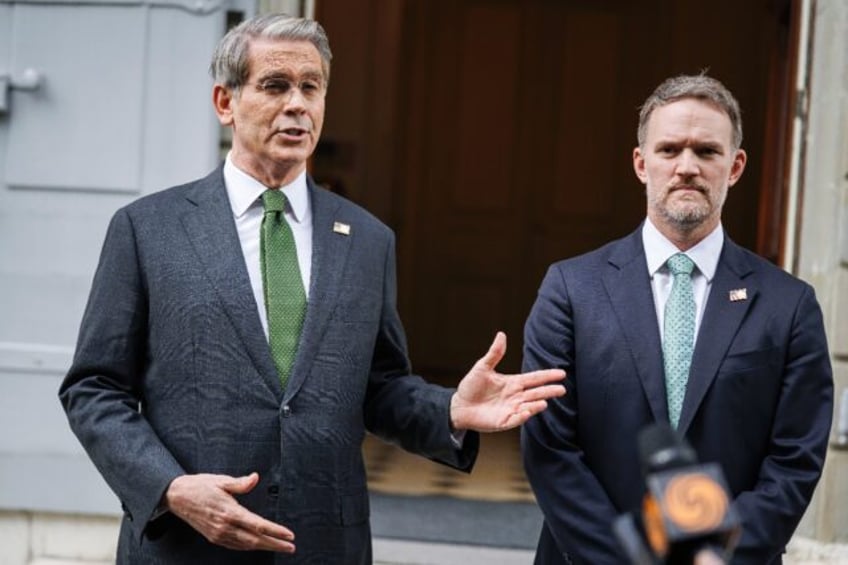US Treasury Secretary Scott Bessent (L) and US Trade Representative Jamieson Greer briefed