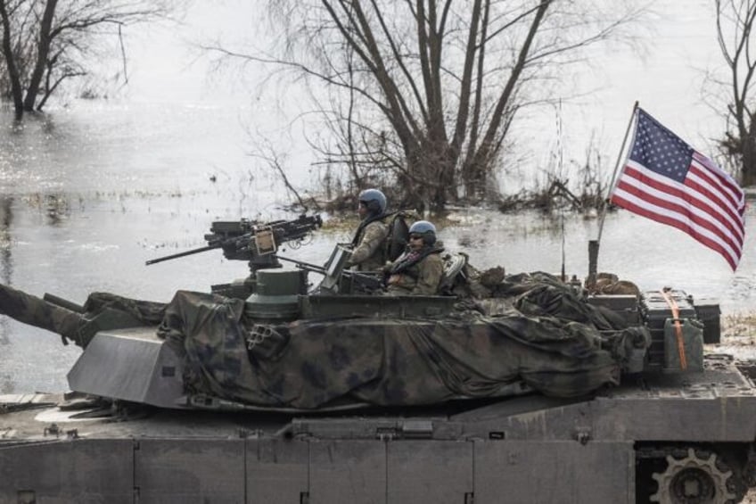 US soldiers on Abrams tanks take part in NATO exercises in Korzeniewo, Polan on March 4, 2