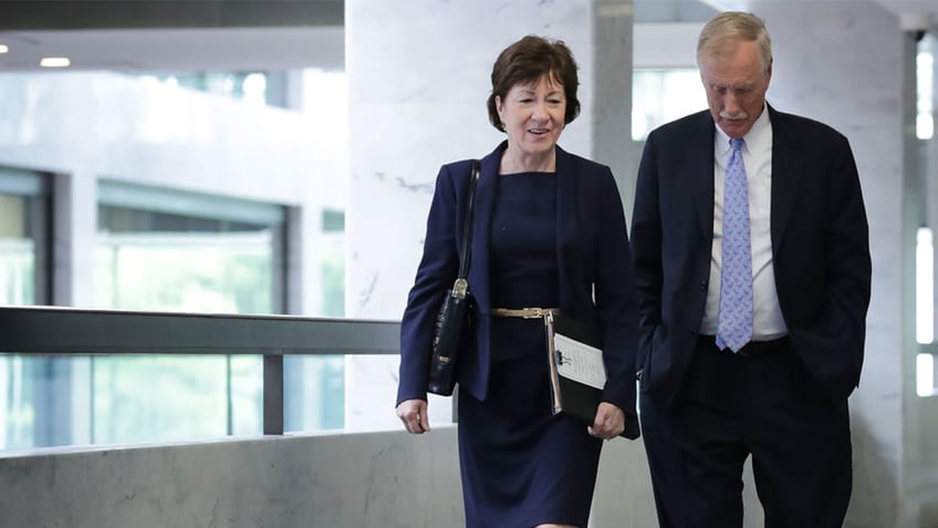 Susan Collins and Angus King walking