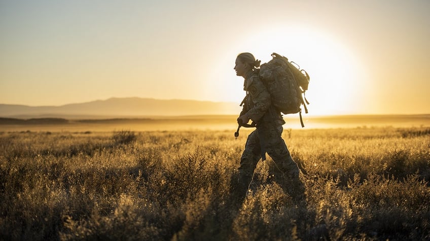 Sgt. Lauren Cox completes an 11-mile ruck 