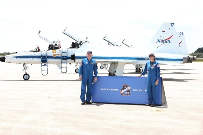 NASA astronauts Suni Williams (R) and Butch Wilmore arrived at the Kennedy Space Center in