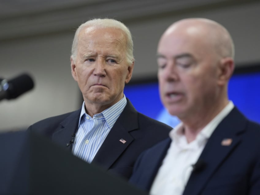 Homeland Security Alejandro Mayorkas delivers remarks during a visit to the southern border, Thursday, Feb. 29, 2024, in Brownsville, Texas, as President Joe Biden, looks on. (AP Photo/Evan Vucci)