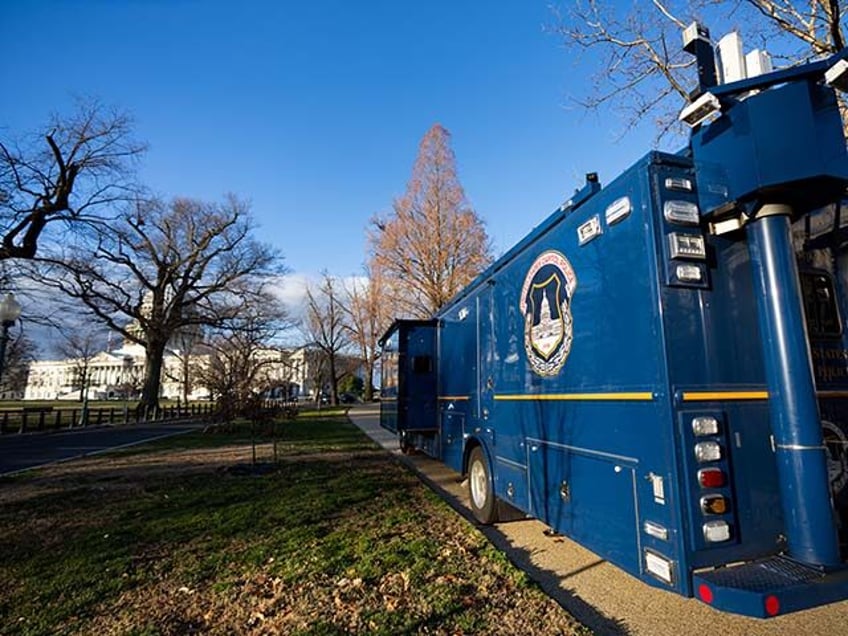 The U.S. Capitol Police mobile command truck is positioned outside the Capitol on Thursday