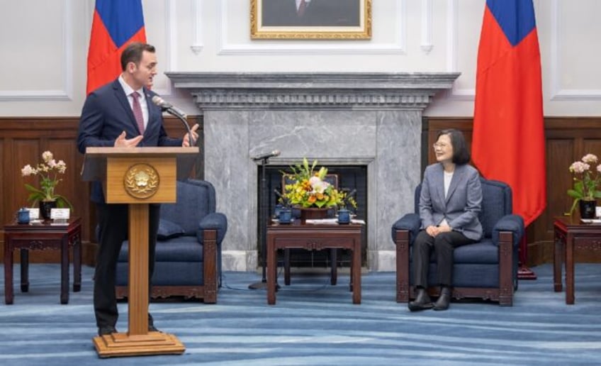 Mike Gallagher (L) heads a five-member delegation that met with Taiwan's President Tsai In