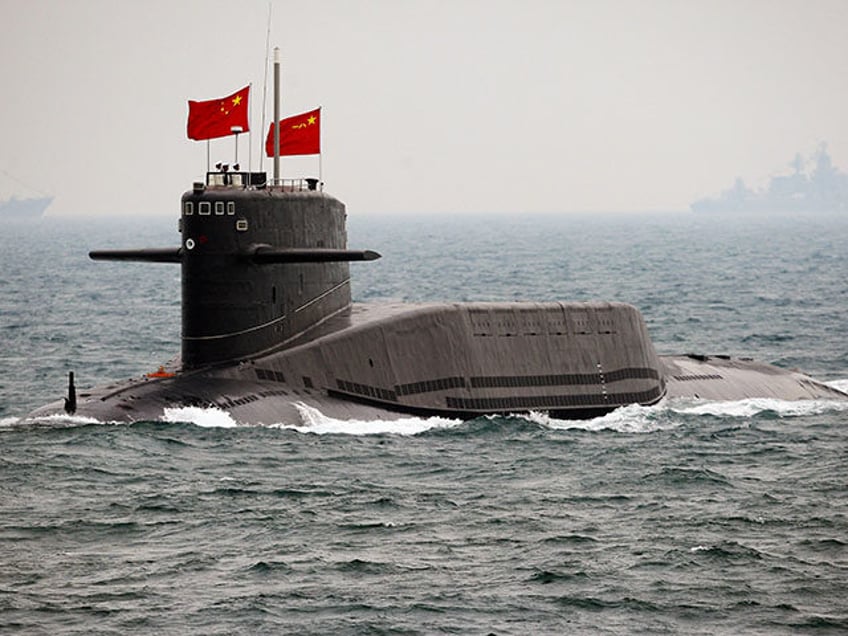 A Chinese Navy submarine attends an international fleet review to celebrate the 60th anniv