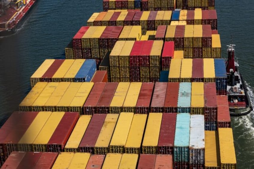 A container ship departs the Port of Newark for the Atlantic Ocean on September 30, 2024 s