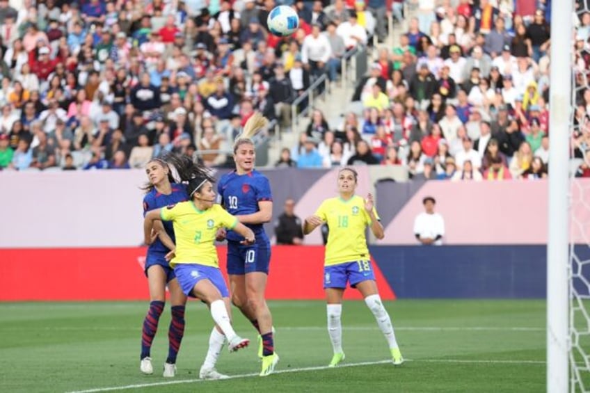 American captain Lindsey Horan heads home the USA's winner in their 1-0 victory over Brazi