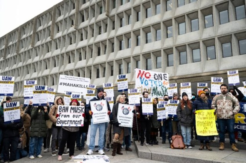 Protesters against Trump administration funding cuts rally outside the US Department of He