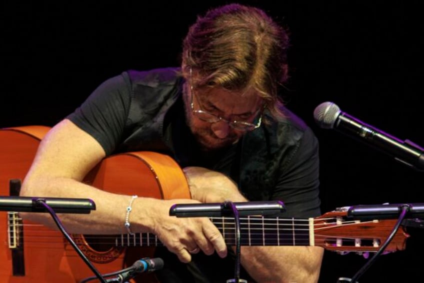 us guitarist al di meola suffers a heart attack on stage in romania but is now in a stable condition