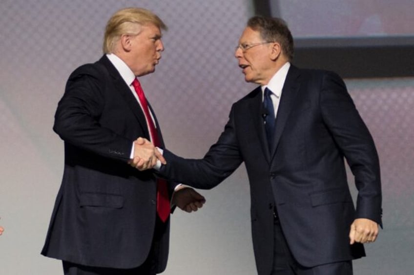 Wayne LaPierre (R) went on trial in New York on Monday accused of using the NRA as a personal piggy bank