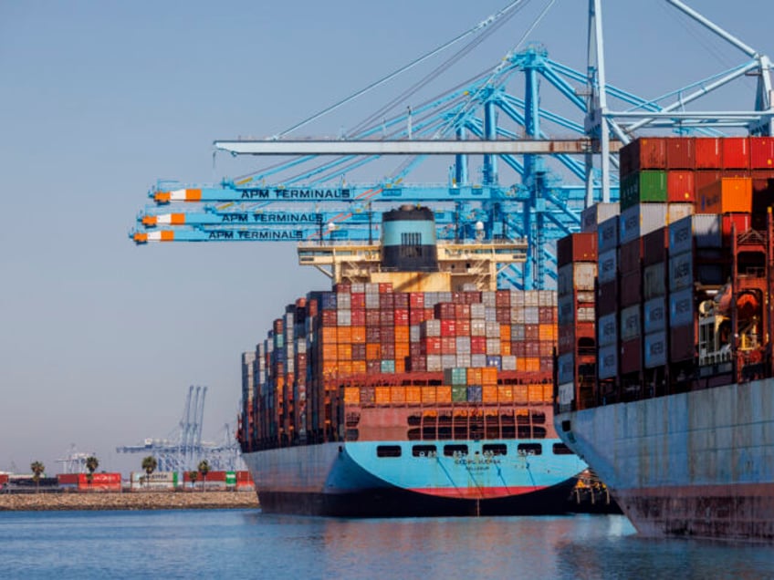 LOS ANGELES, CA - MAY 9, 202: Container ships are among the few unloaded and loaded at th