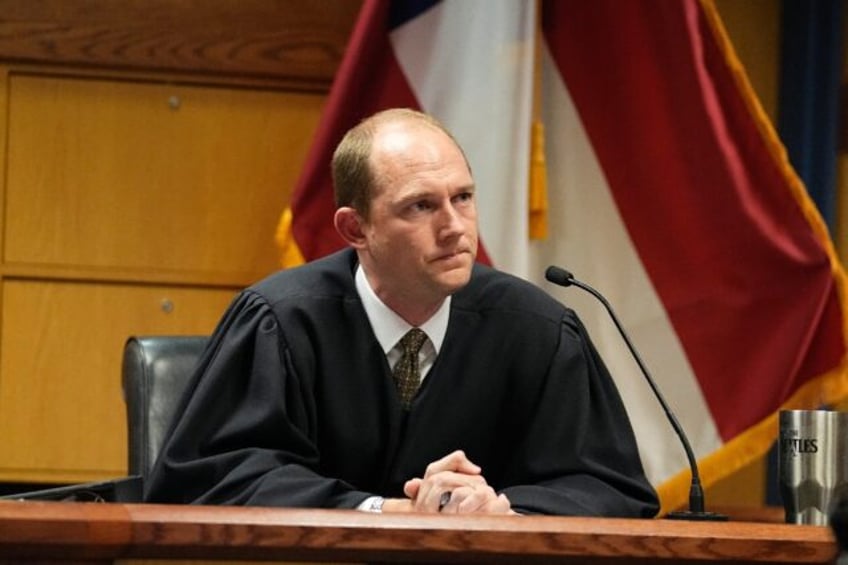 Superior Court Judge Scott McAfee dismissed several charges in the indictment of Donald Tr