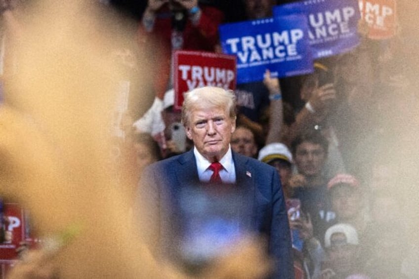 Donald Trump looks on during an election campaign rally in Bozeman, Montana on August 9, 2