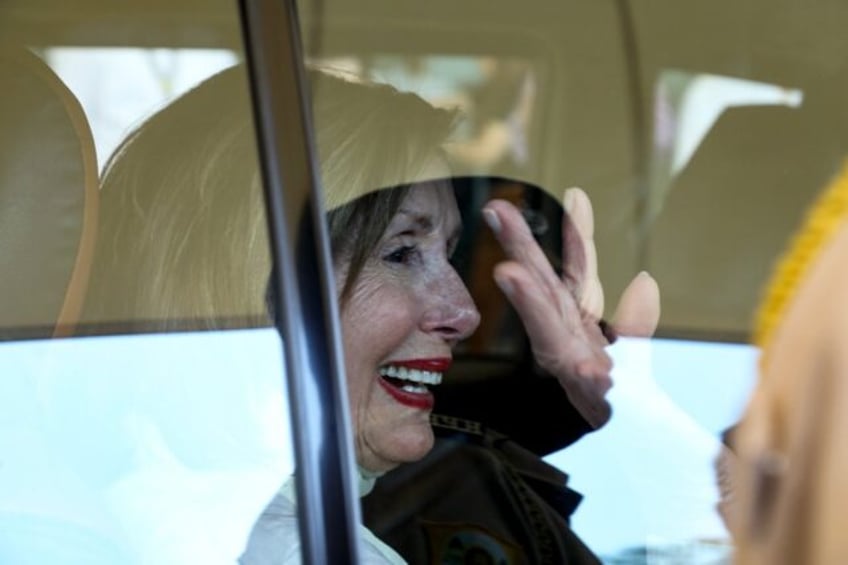 Nancy Pelosi, former speaker of the US House of Representatives waves to the crowd upon he