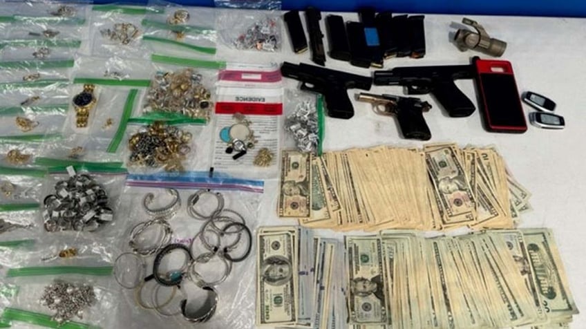 recovered jewelry, guns and cash