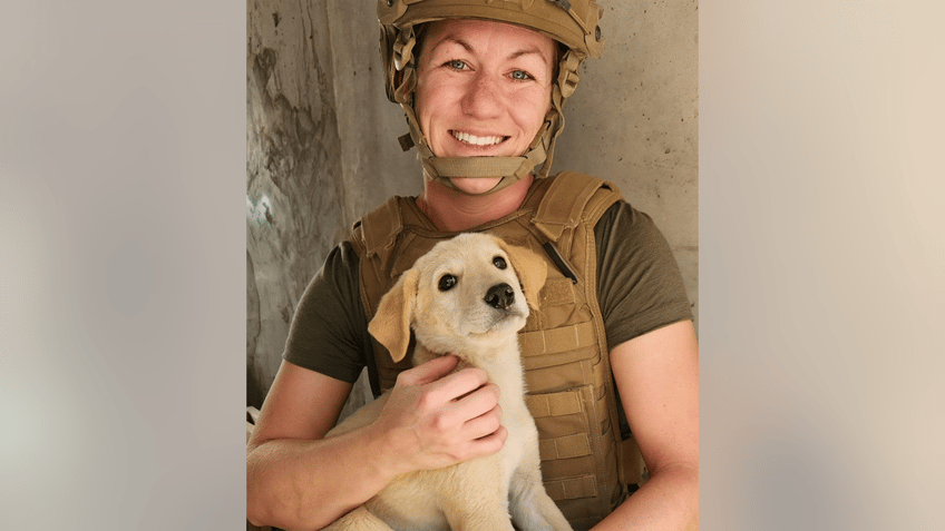 us navy sailor launches rescue of small puppy saved during overseas deployment cant leave a comrade behind