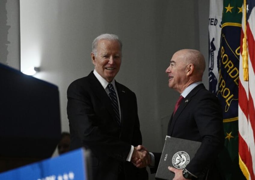 US President Joe Biden (left) and Homeland Security Secretary Alejandro Mayorkas are both facing Republican-led impeachment hearings