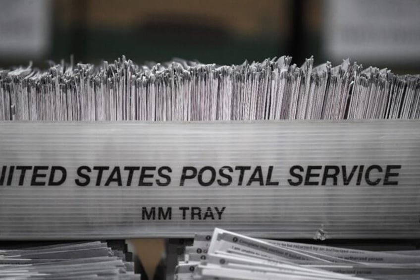 Mail-in ballots in their envelopes await processing in Pomona, California in October 2020