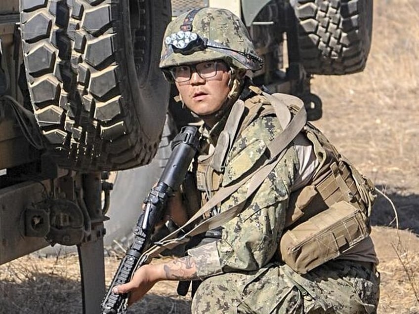 Petty Officer 3rd Class Wenheng Zhao during a field training exercise at Fort Hunter Liggett, Calif., in 2019. Zhao, who had since risen in rank to petty officer 2nd class, was sentenced to more than two years in prison and kicked out of the Navy for passing sensitive information about …