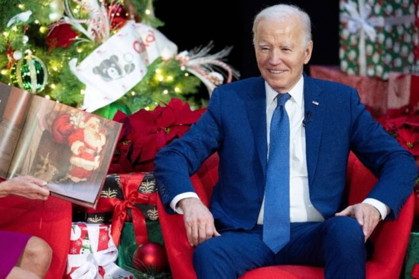US President Joe Biden pays a holiday visit to patients and families at Children's National Hospital in Washington on December 22, 2023