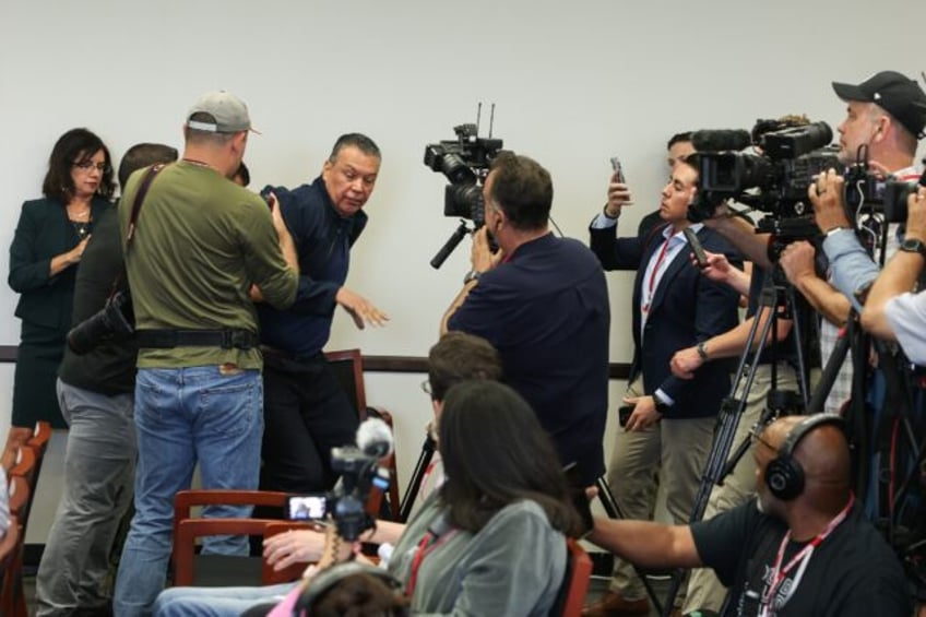 US Senator Alex Padilla was bundled from the room after trying to ask Homeland Security Se